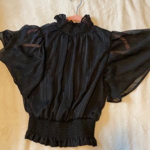 Black flowing blouse